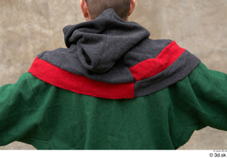  Photos Medieval Servant in suit 4 Green gambeson Medieval clothing grey red and hood medieval servant upper body 0011.jpg